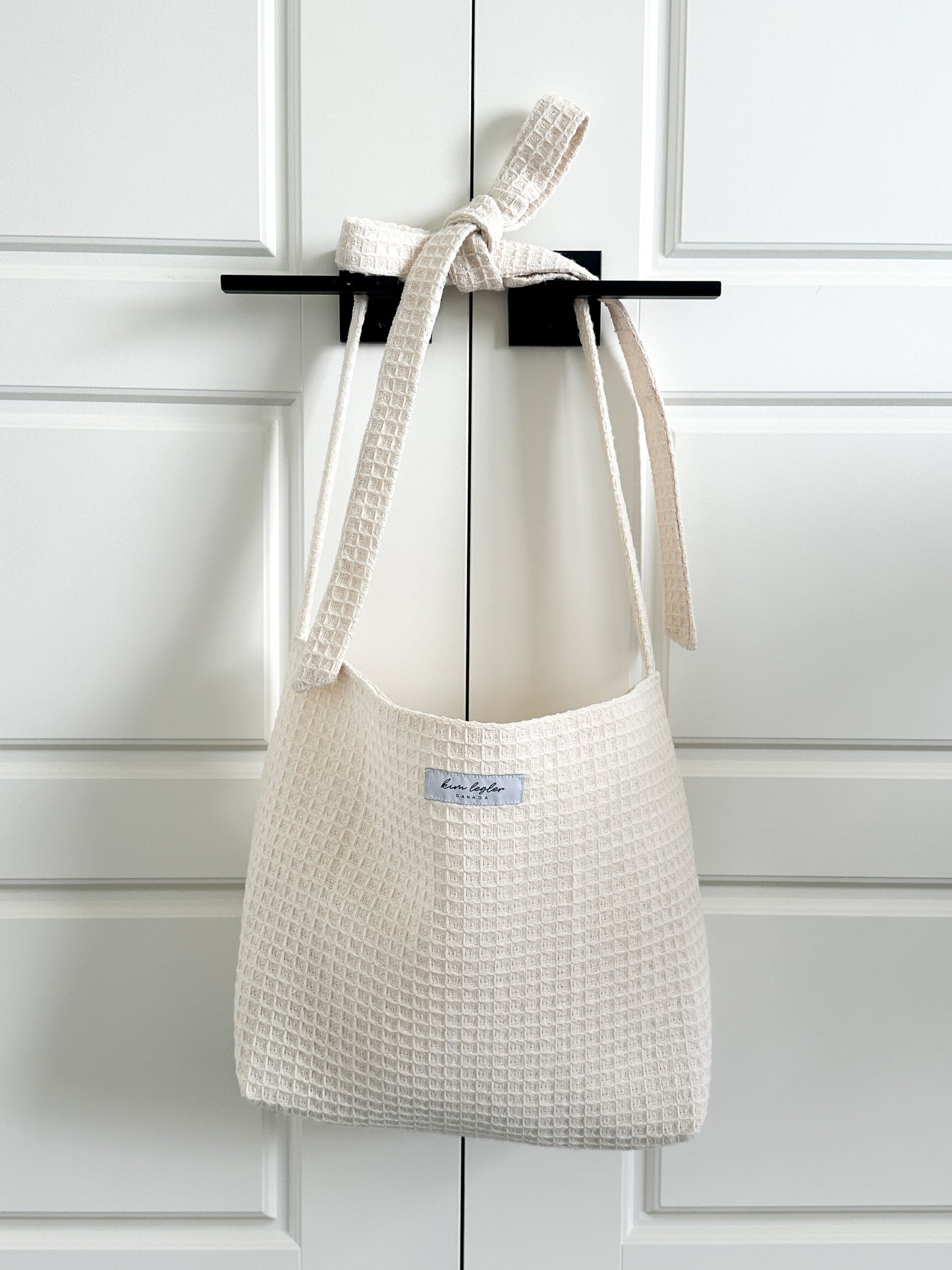 waffle knit cotton/burlap cream tote bag with adjustable bow strap