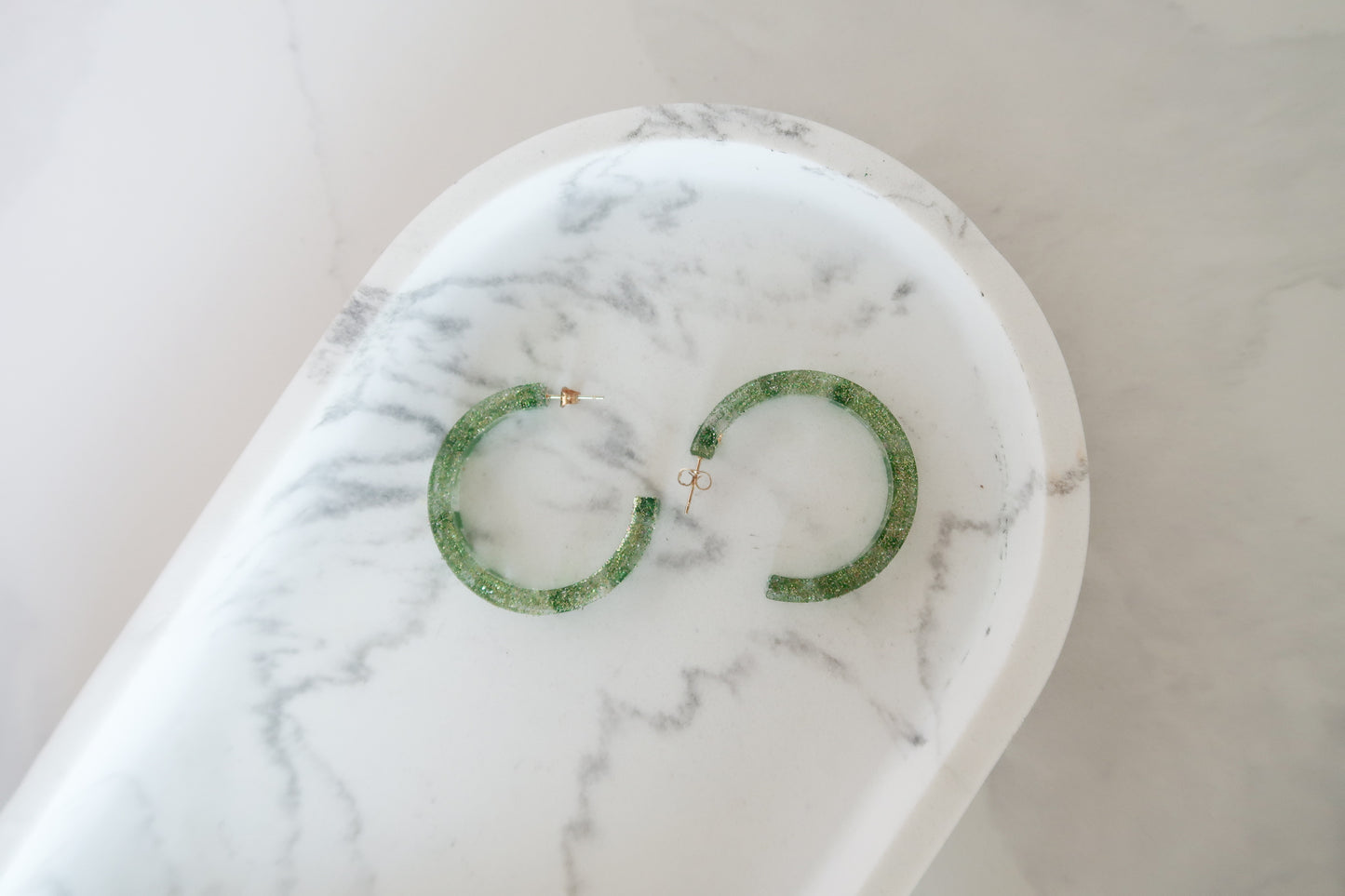 Oversized sparkly green handmade resin earrings