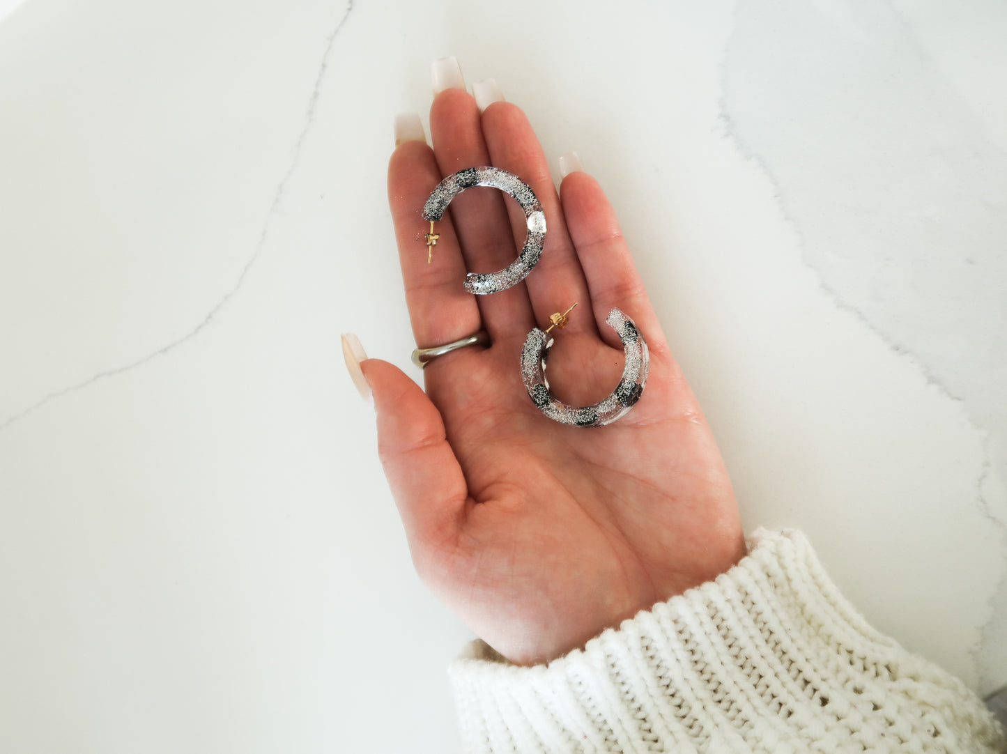 metallic resin earrings in silver colors