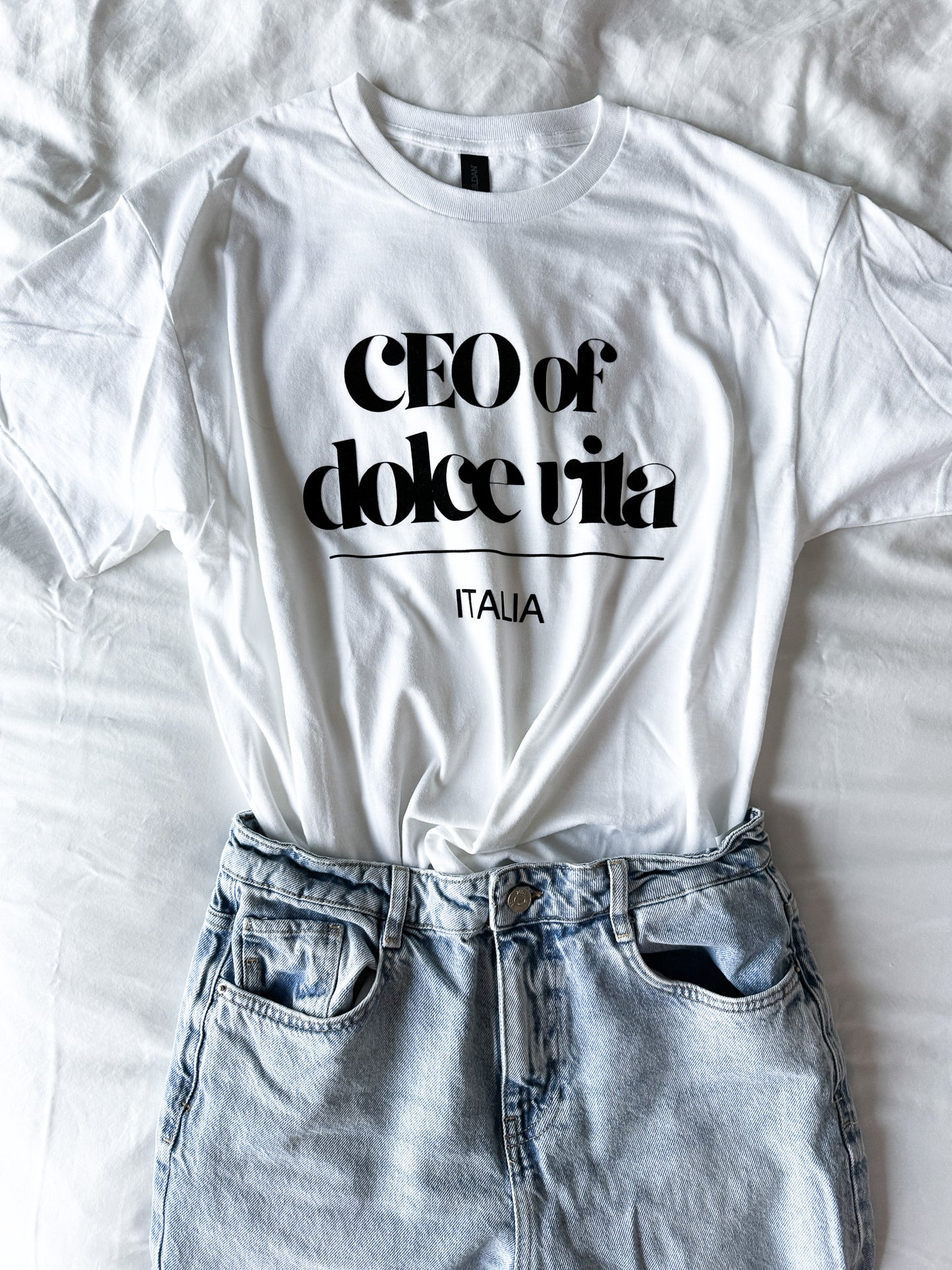 White t-shirt with 'CEO of dolce vita Italia' text on a white background