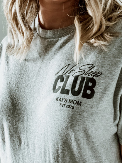 Gray sweatshirt with 'No Sleep Club KAI'S MOM EST 2025' text