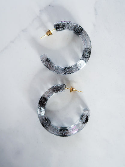 resin earrings with sparkles and sequin details
