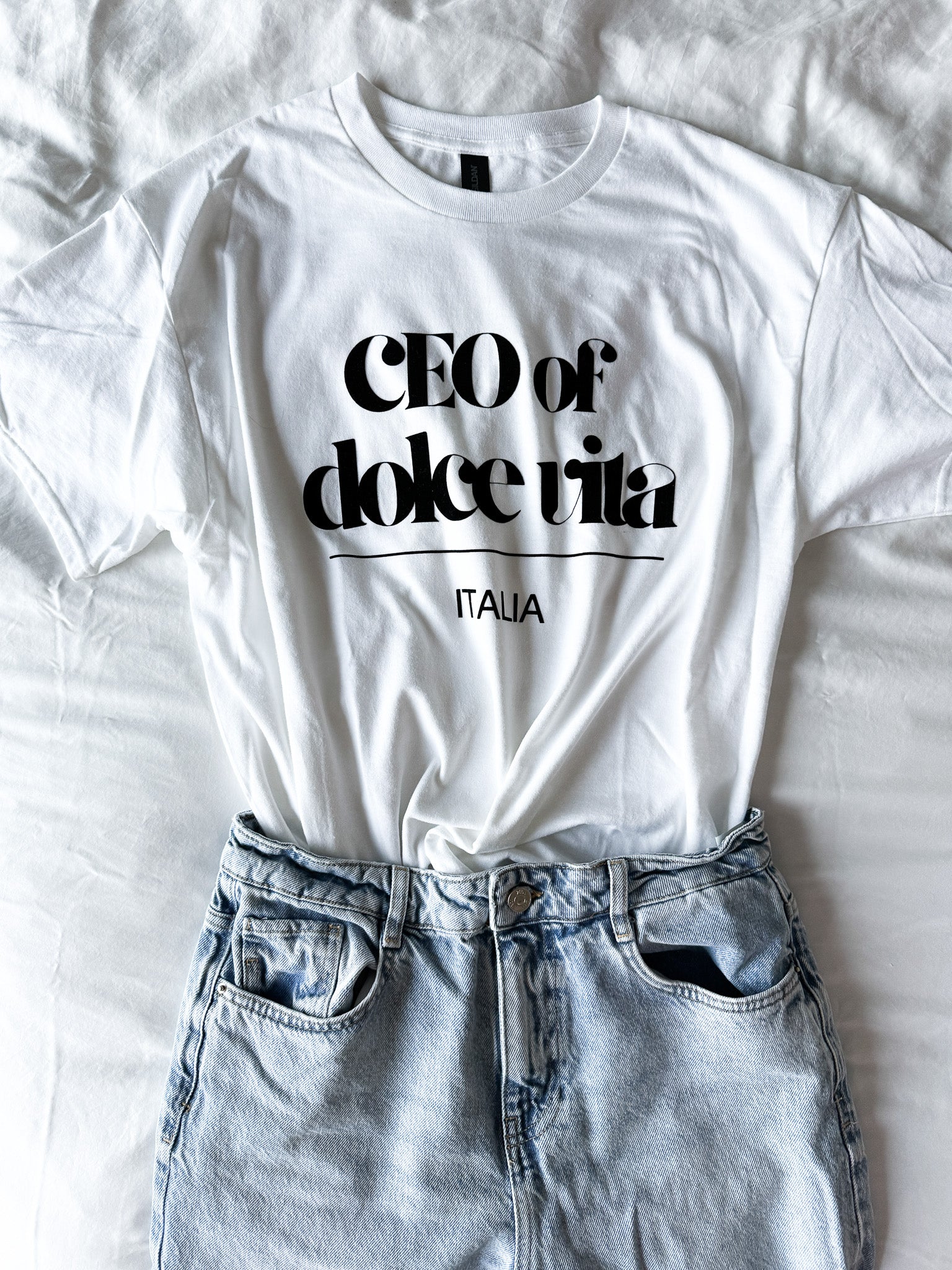 White t-shirt with 'CEO of dolce vita Italia' text on a white background