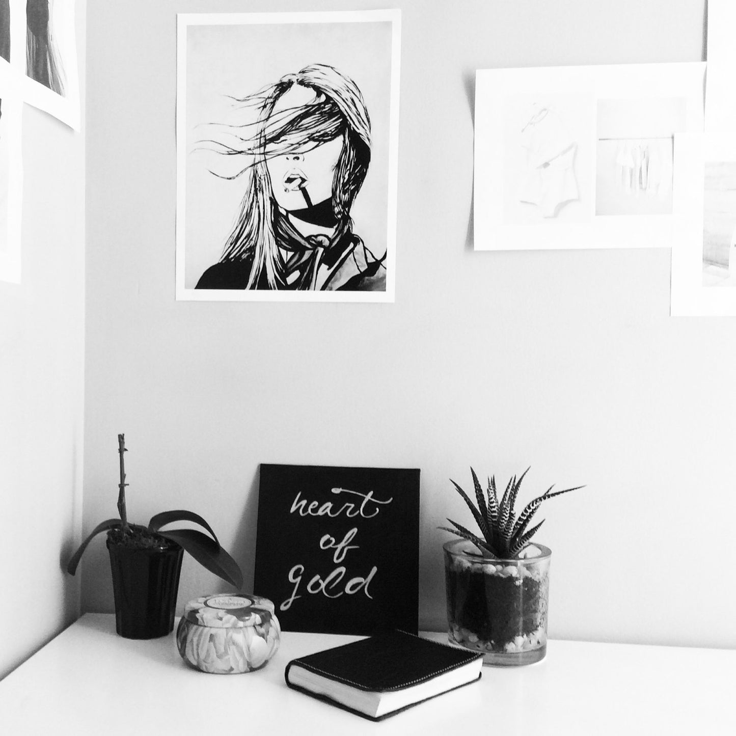 black and white artwork in office setting